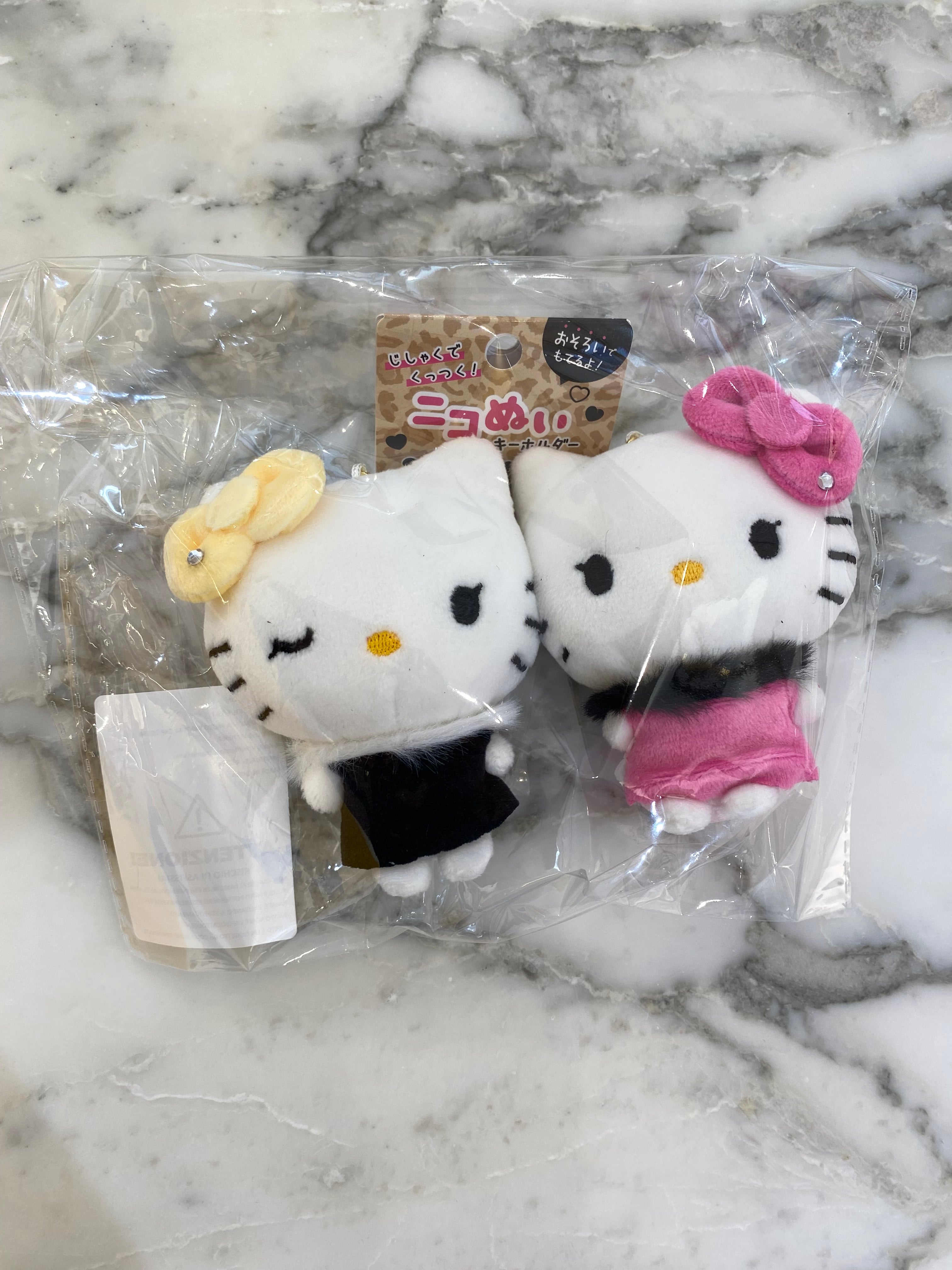 Hello Kitty Coppia Pendant